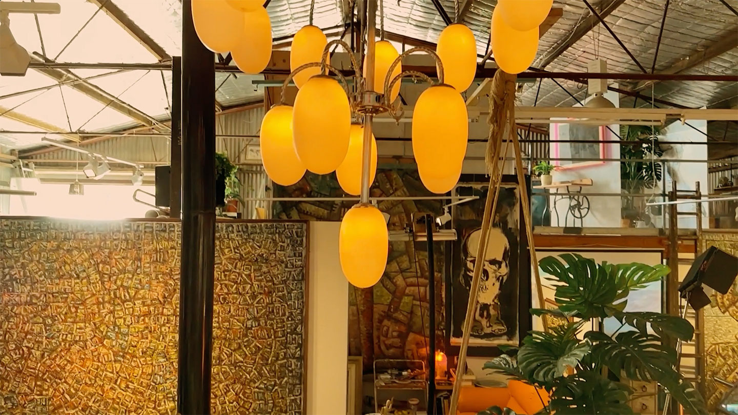 The gallery is located within a repurposed warehouse